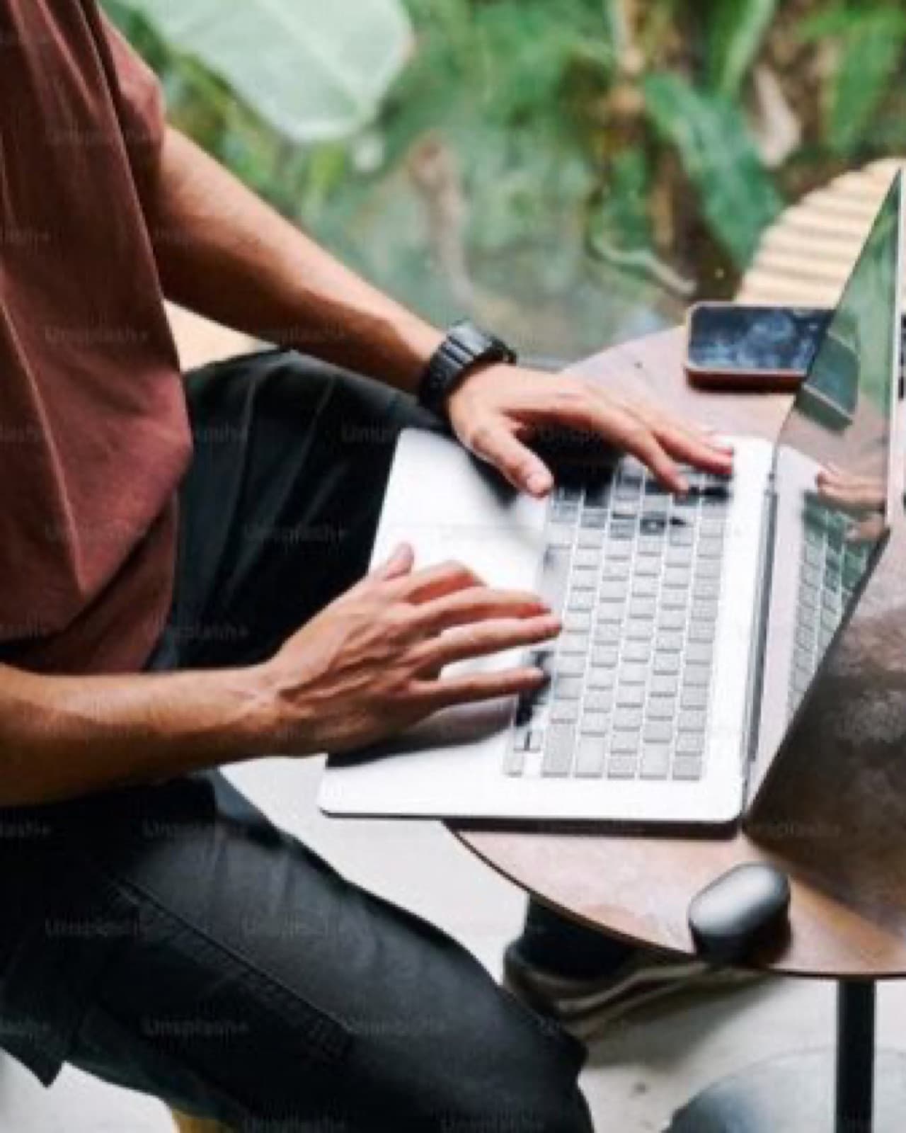 Analysing research data on a laptop in the field